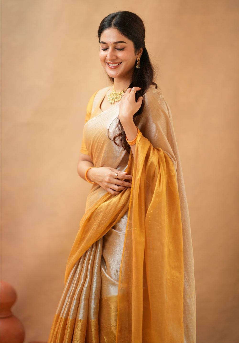 Elegance Redefined – Tissue Cotton Half & Half Saree