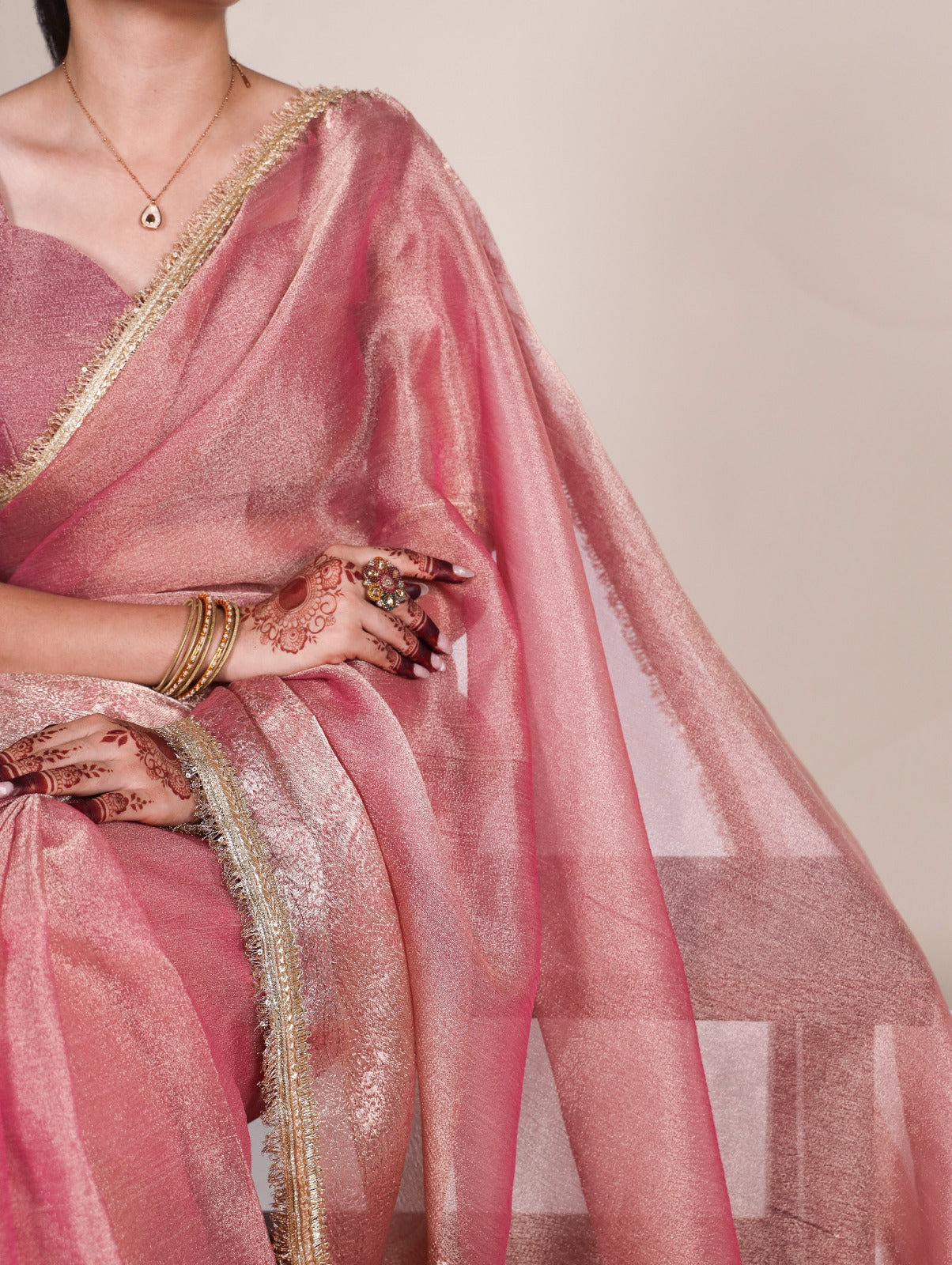 Golden Glow Tissue Shimmer Saree with Zari Weaving & Sequins Lace Border