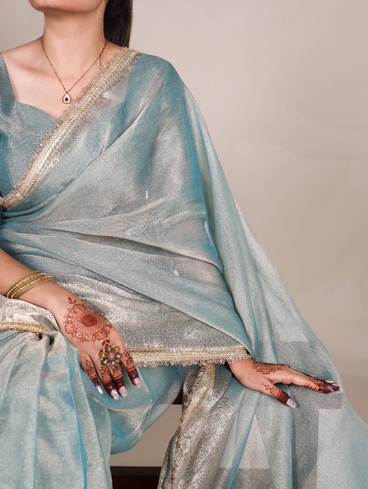 Golden Glow Tissue Shimmer Saree with Zari Weaving & Sequins Lace Border