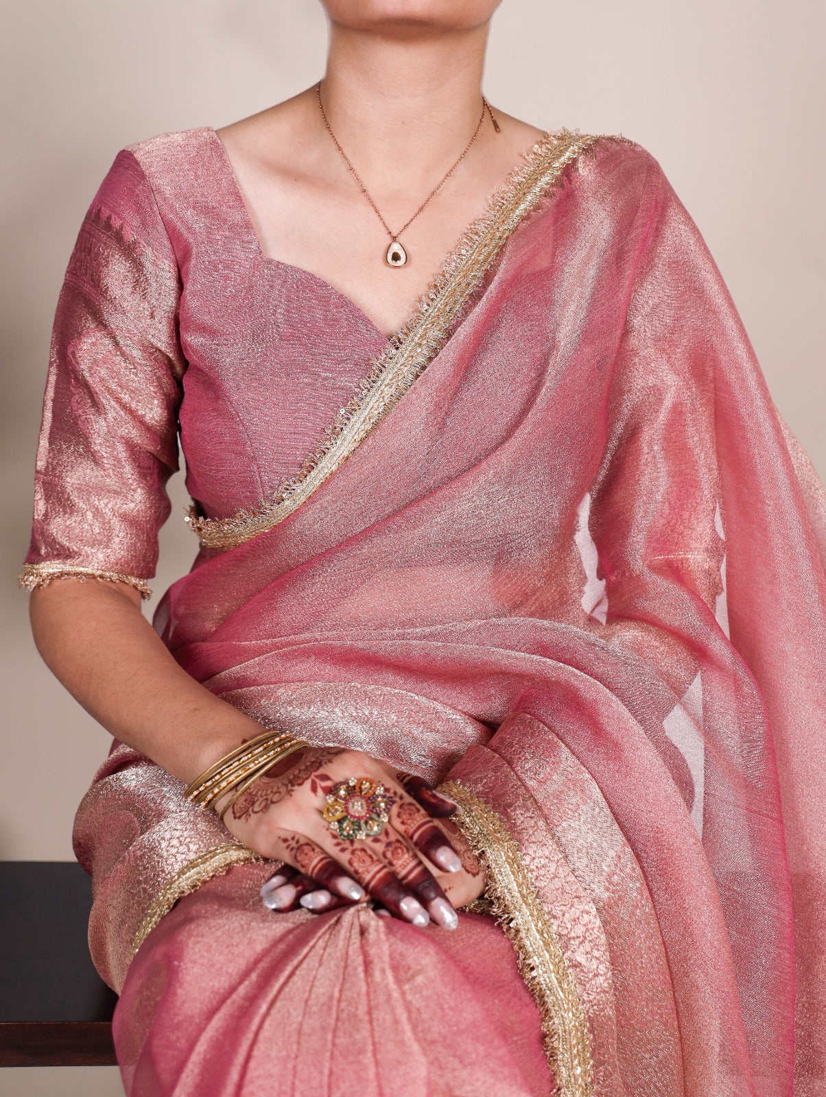 Golden Glow Tissue Shimmer Saree with Zari Weaving & Sequins Lace Border