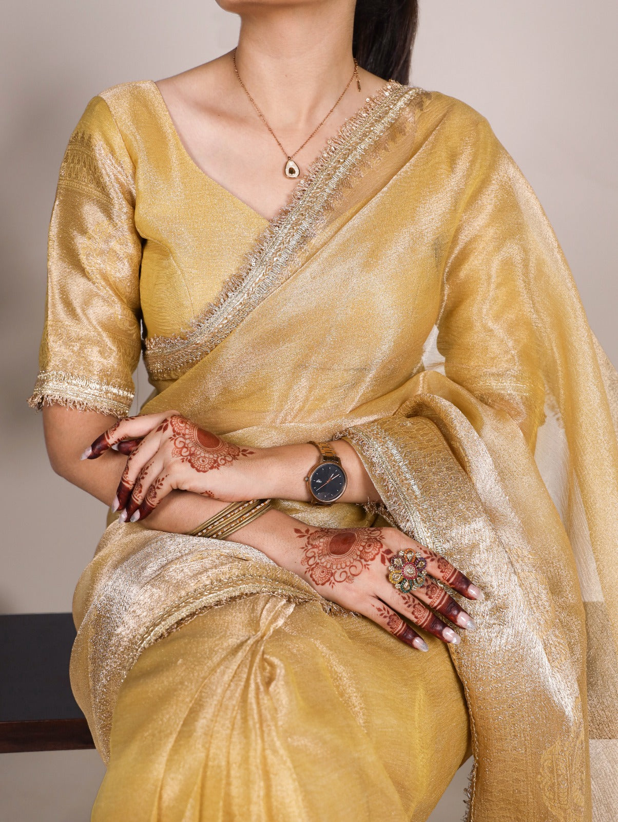 Golden Glow Tissue Shimmer Saree with Zari Weaving & Sequins Lace Border